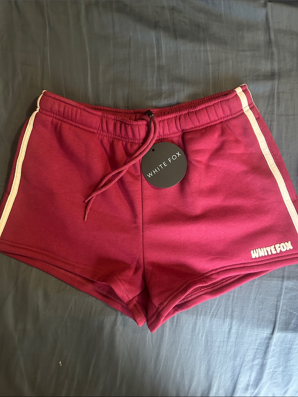 White Fox Boutique Burgundy Athletic Drawstring Shorts with White Stripes